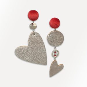 Unpaired heart-shaped earrings